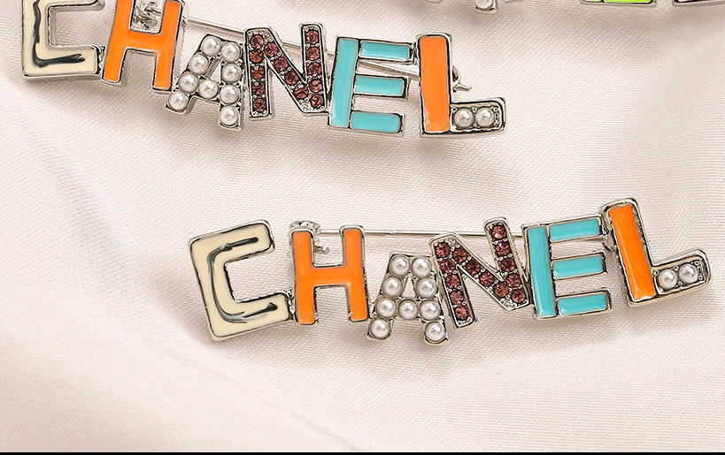 CC lapil, pearls, zircon Brooch