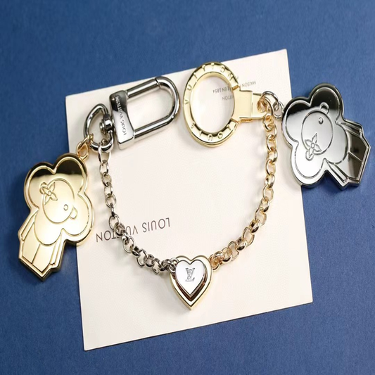 LV Vivianne gold/silver bag charm